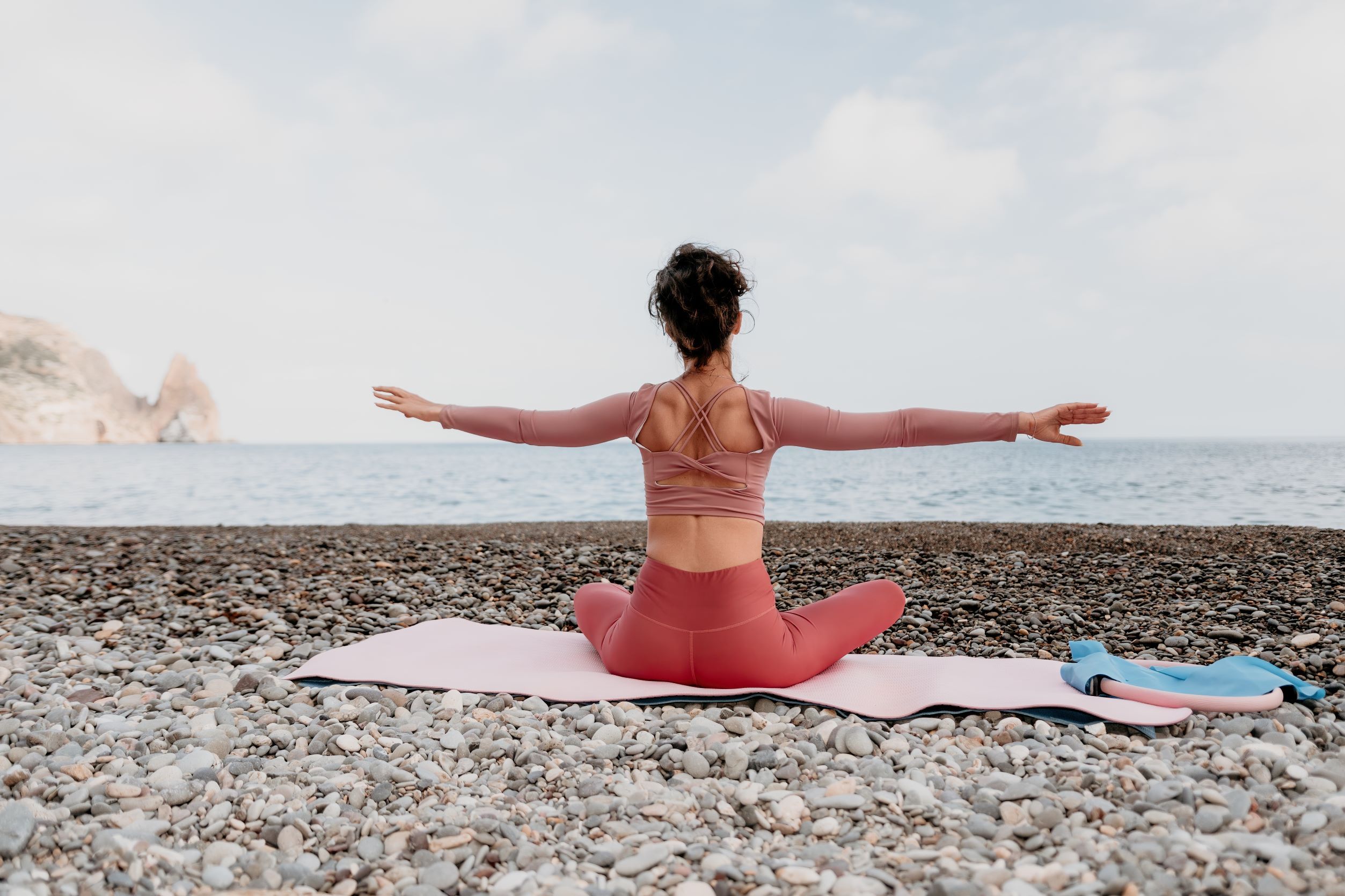 woman-sea-pilates-sporty-happy