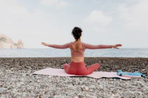 woman-sea-pilates-sporty-happy-middle-aged-woman-practicing