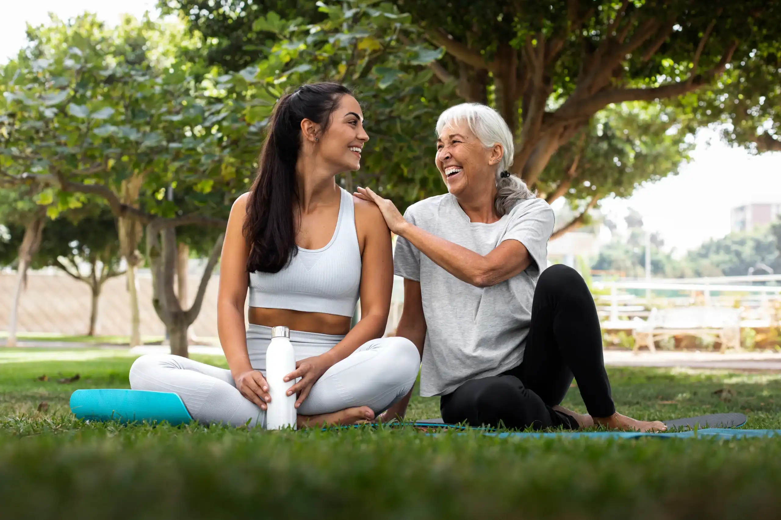 friends-doing-yoga-together-park